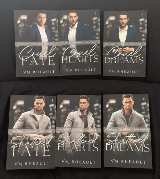 Photo of six book covers for King's Crossing Series. Books 1-3 has a man in a navy suit, books 4-6 has a man wearing a grey jacket
