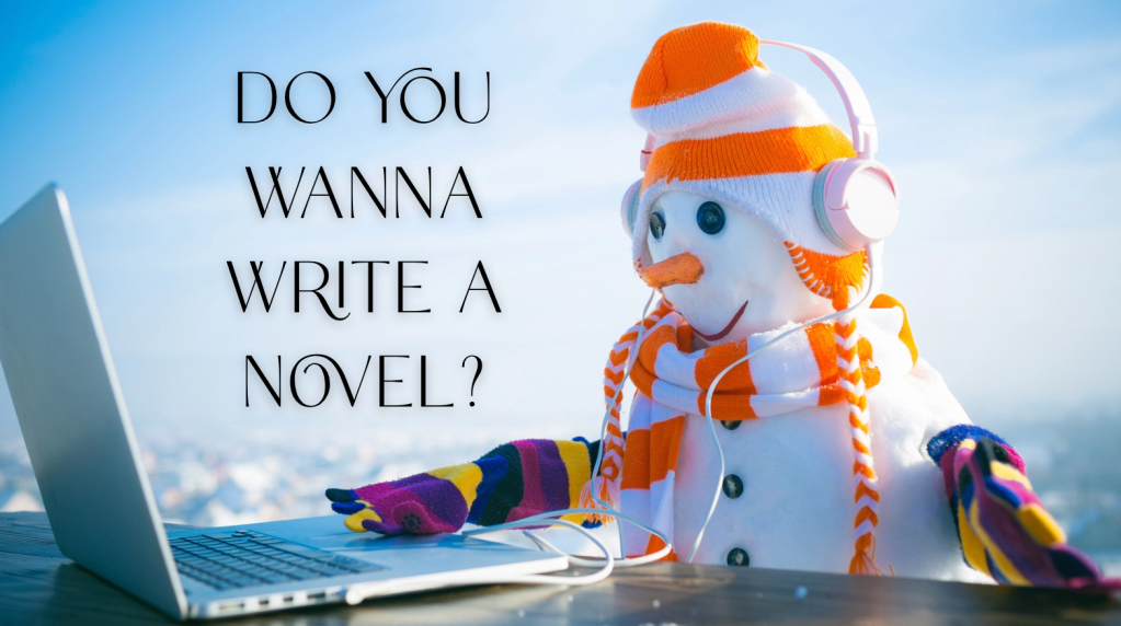 snowman wearing orange and white hat and scare sitting in front of a laptop outside blue sky
