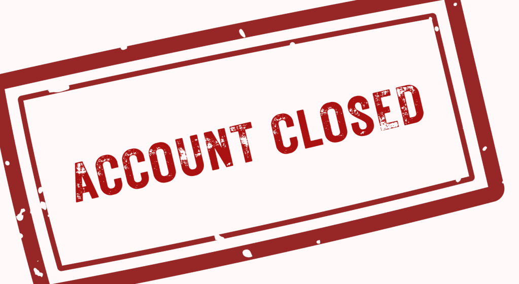 text that looks like a rubber stamp. red letters that say account closed