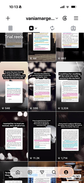 Screenshot of an Instagram Reels grid showing several book promotion reels. Most feature highlighted excerpts from romance and romantic suspense novels over dark or blurred video backgrounds, with short hook text above the excerpts. Reel view counts range from a few dozen to over 11,000.